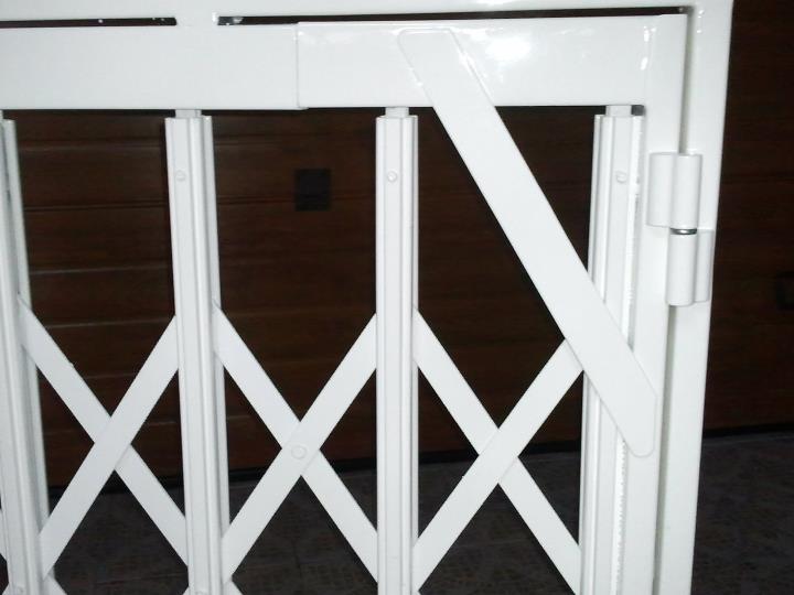 Reja extensible y abatible